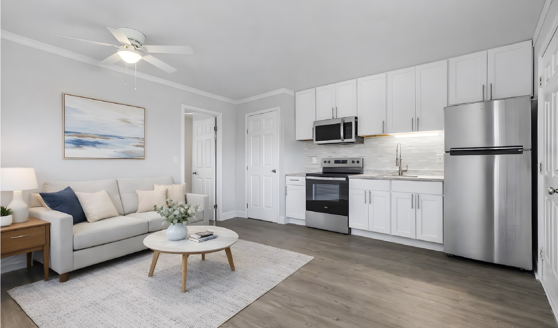 a living room with a couch and a table