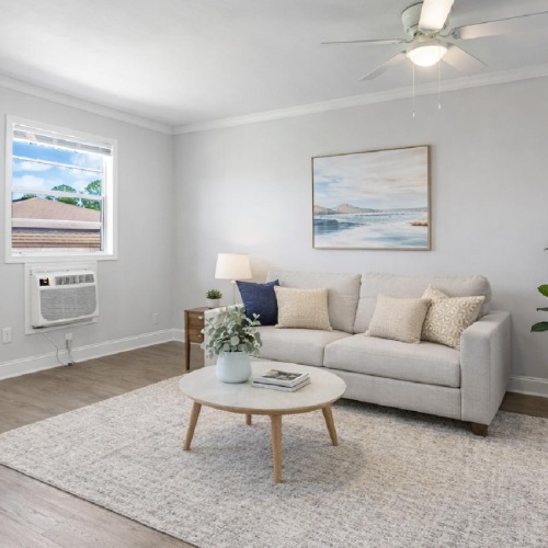 a living room with a couch and a table